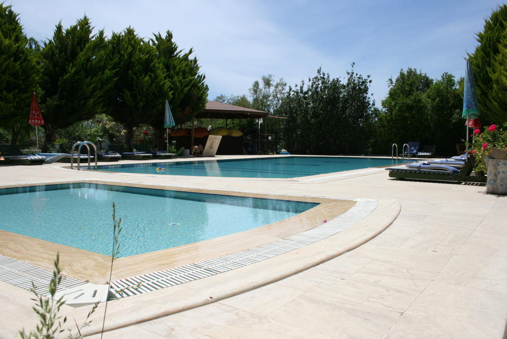 Paradise Garden Gumusluk Evleri Aparthotel Buitenkant foto