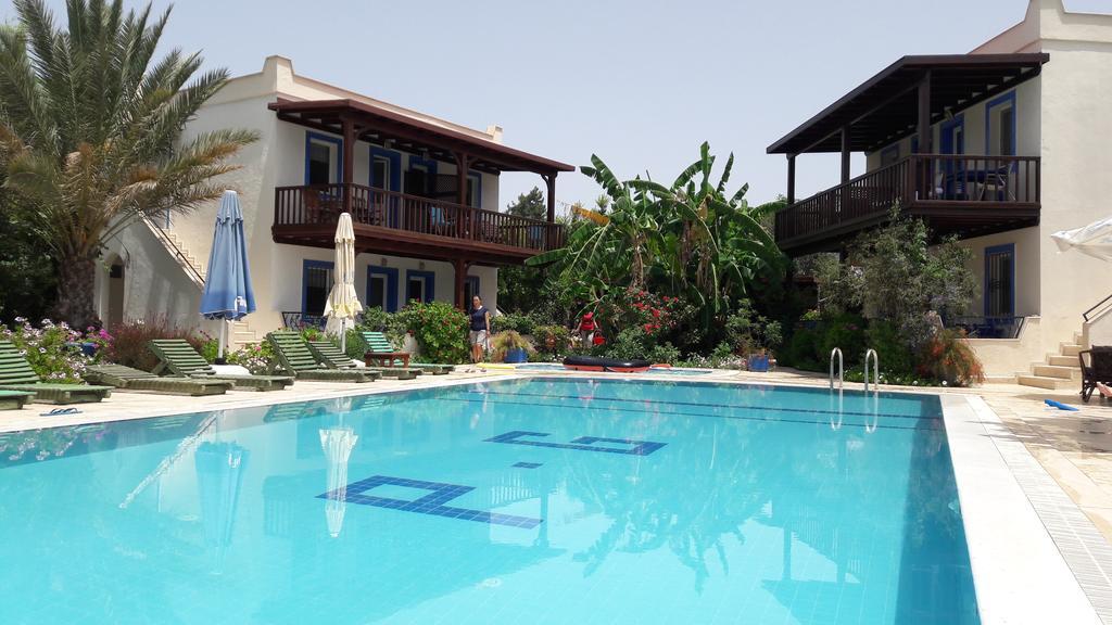 Paradise Garden Gumusluk Evleri Aparthotel Buitenkant foto