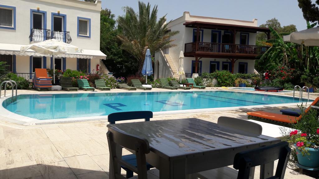 Paradise Garden Gumusluk Evleri Aparthotel Buitenkant foto